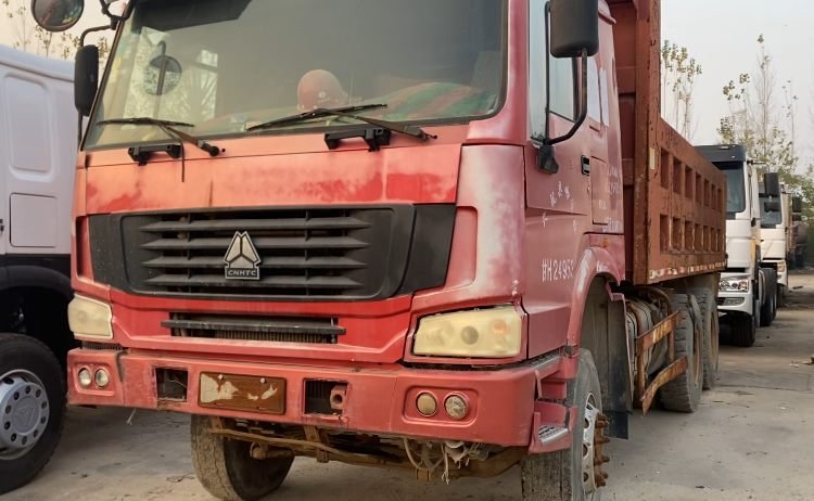First-hand used truck being assessed on the procurement lot before selection