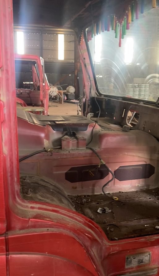 Cab interior stripped with aged liners removed for replacement
