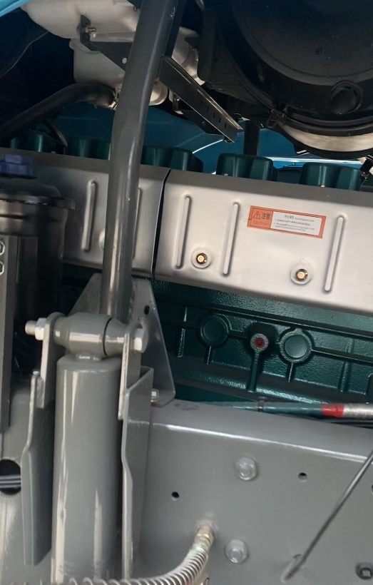 Truck undergoing pre-delivery inspection before shipment