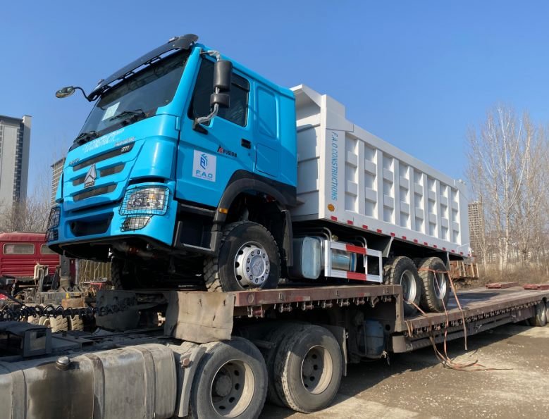 Truck fully treated with protective shipping wax for ocean transport